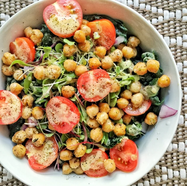 Quinoa power bowl with greens and tahini
